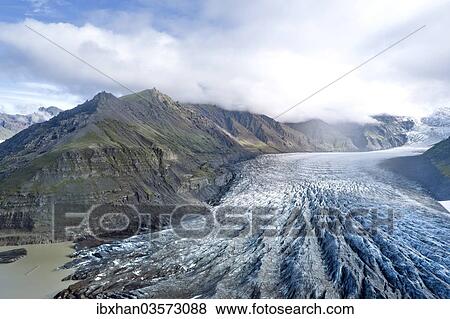 "Aerial view of the glacier tongue of Svinafellsjoekull Glacier, Southern Region, Iceland, Europe" View Large Photo Image Stock Photo - "Aerial view of the glacier tongue of Svinafellsjoekull Glacier, Southern Region, Iceland, Europe". Fotosearch