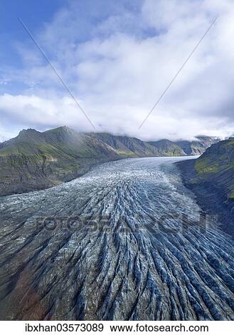 "Aerial view of the glacier tongue of Svinafellsjoekull Glacier, Southern Region, Iceland, Europe" View Large Photo Image Stock Photo - "Aerial view of the glacier tongue of Svinafellsjoekull Glacier, Southern Region, Iceland, Europe". Fotosearch