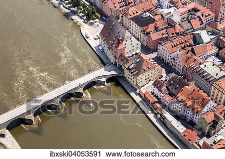 Stock Image - "Aerial view, old town with the Steinernen Brucke bridge over the Danube, Bruckentor Bridge Gate and the Salzstadl, Regensburg, Upper Palatinate, Bavaria, Germany, Europe". Fotosearch
