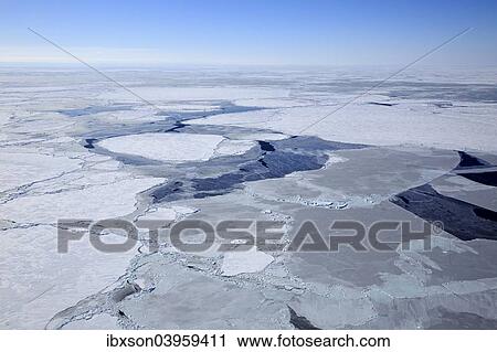 Stock Image - "Aerial view, pack ice, Magdalen Islands, Gulf of Saint Lawrence, Quebec, Canada, North America". Fotosearch