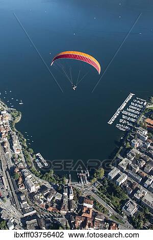 "Aerial view, paraglider, marina, Lake Maggiore, Locarno, Kanton Tessin, Switzerland, Europe" View Large Photo Image Stock Image - "Aerial view, paraglider, marina, Lake Maggiore, Locarno, Kanton Tessin, Switzerland, Europe". Fotosearch