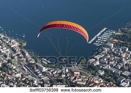 "Aerial view, paraglider, marina, Lake Maggiore, Locarno, Kanton Tessin, Switzerland, Europe" View Large Photo Image Stock Photo - "Aerial view, paraglider, marina, Lake Maggiore, Locarno, Kanton Tessin, Switzerland, Europe". Fotosearch