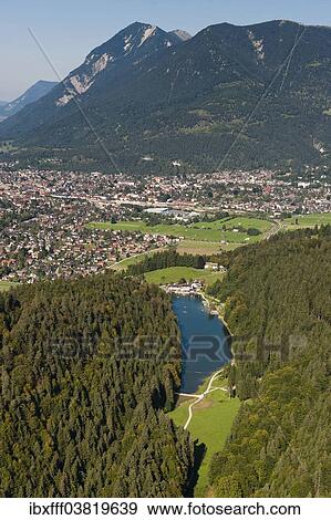 "Aerial view, Riessersee, Garmisch-Partenkirchen, Mt Wank, Wetterstein Range, Loisachtal Valley, Werdenfelser Land Region, Bayerisches Oberland, Bavaria, Germany, Europe" View Large Photo Image Stock Photo - "Aerial view, Riessersee, Garmisch-Partenkirchen, Mt Wank, Wetterstein Range, Loisachtal Valley, Werdenfelser Land Region, Bayerisches Oberland, Bavaria, Germany, Europe". Fotosearch