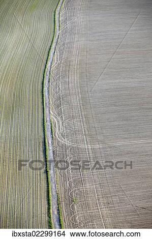"Aerial view, road through a field in the Elbe Sandstone Mountains, Saxony, Germany, Europe" View Large Photo Image Picture - "Aerial view, road through a field in the Elbe Sandstone Mountains, Saxony, Germany, Europe". Fotosearch