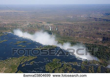 "Aerial view, smoke cloud at Victoria Falls, Livingstone, Zambia, Africa" View Large Photo Image Stock Photo - "Aerial view, smoke cloud at Victoria Falls, Livingstone, Zambia, Africa". Fotosearch