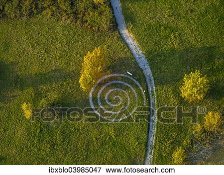 "Aerial view, spiralling path, quarries with a health trail, Geseke, North Rhine-Westphalia, Germany, Europe" View Large Photo Image Stock Photo - "Aerial view, spiralling path, quarries with a health trail, Geseke, North Rhine-Westphalia, Germany, Europe". Fotosearch