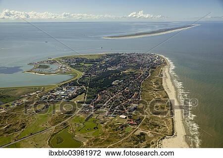 Stock Image - "Aerial view, town of Norderney, western part of the island, Wadden Sea, Norderney, island in the North Sea, East Frisian Islands, Lower Saxony, Germany, Europe". Fotosearch