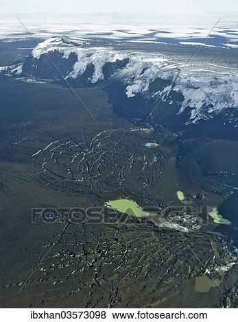 "Aerial view, Vatnajoekull or Vatna Glacier coated with ash from a recent volcanic eruption, Southern Region, Iceland, Europe" View Large Photo Image Stock Photo - "Aerial view, Vatnajoekull or Vatna Glacier coated with ash from a recent volcanic eruption, Southern Region, Iceland, Europe". Fotosearch
