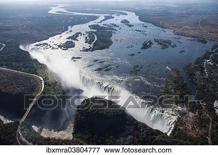 "Aerial view, Victoria Falls with the Victoria Falls Bridge over the Zambezi River, Livingstone, Zambia, Africa" View Large Photo Image Stock Photo - "Aerial view, Victoria Falls with the Victoria Falls Bridge over the Zambezi River, Livingstone, Zambia, Africa". Fotosearch