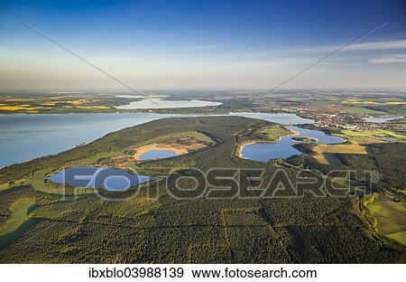"Aerial view, Waren National Park, Waren, Mecklenburg Lake District or Mecklenburg Lakeland, Mecklenburg-Western Pomerania, Germany, Europe" View Large Photo Image Stock Photo - "Aerial view, Waren National Park, Waren, Mecklenburg Lake District or Mecklenburg Lakeland, Mecklenburg-Western Pomerania, Germany, Europe". Fotosearch