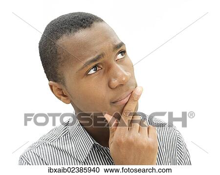 Stock Image - "African-American man, young American, pensive face, sceptical". Fotosearch