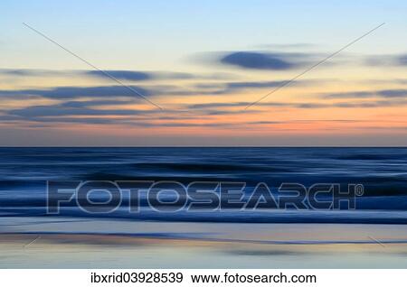 Stock Photo - "Afterglow, North Sea, Texel, The Netherlands, Europe". Fotosearch