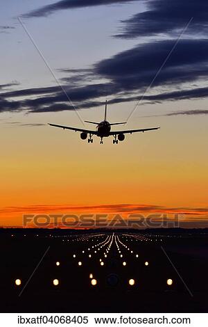 "Airplane landing at sunset, Airbus, Munich Airport, Erding, Munich, Bavaria, Germany, Europe" View Large Photo Image Stock Photography - "Airplane landing at sunset, Airbus, Munich Airport, Erding, Munich, Bavaria, Germany, Europe". Fotosearch