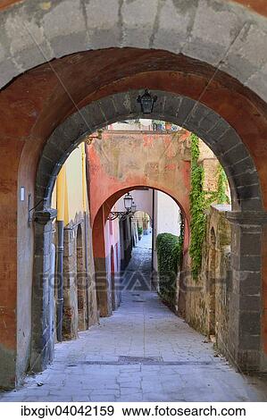 "Alley with archways in the old town, Centro Storico, Tuscania, Viterbo, Lazio, Italy, Europe" View Large Photo Image Stock Photo - "Alley with archways in the old town, Centro Storico, Tuscania, Viterbo, Lazio, Italy, Europe". Fotosearch