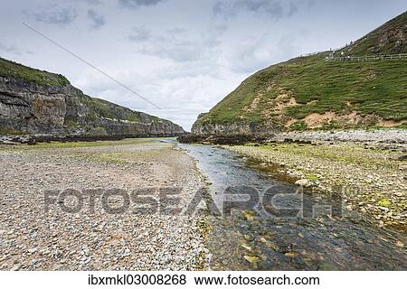Stock Photo - "Allt Smoo flowing through Geodha Smoo fjord, Durness, Sutherland County, Highland, Scotland, United Kingdom, Europe". Fotosearch