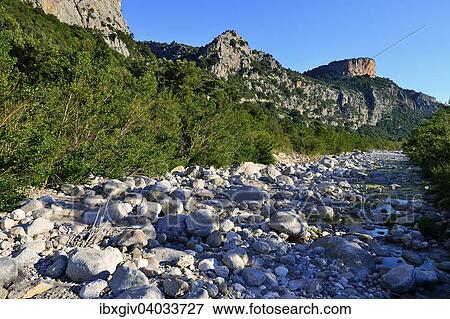 "Almost dry river bed of the Riu Fiumineddu, Gennargentu National Park, Supramonte, Province of Nuoro, Sardinia, Italy, Europe" View Large Photo Image Stock Photo - "Almost dry river bed of the Riu Fiumineddu, Gennargentu National Park, Supramonte, Province of Nuoro, Sardinia, Italy, Europe". Fotosearch