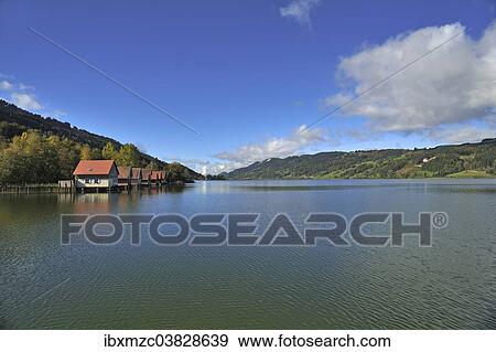 "Alpsee lake with boathouses, Buhl am Alpsee, Upper Allgau, Bavaria, Germany, Europe" View Large Photo Image Stock Photo - "Alpsee lake with boathouses, Buhl am Alpsee, Upper Allgau, Bavaria, Germany, Europe". Fotosearch