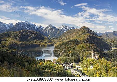 "Alpsee lake with Schloss Hohenschwangau Castle in autumn, Fussen, East Allgau, Bavaria, Germany, Europe" View Large Photo Image Stock Photo - "Alpsee lake with Schloss Hohenschwangau Castle in autumn, Fussen, East Allgau, Bavaria, Germany, Europe". Fotosearch