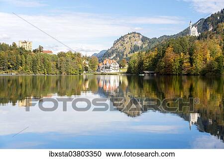 "Alpsee lake with the royal castles of Schloss Neuschwanstein and Schloss Hohenschwangau in autumn, Fussen, East Allgau, Bavaria, Germany, Europe" View Large Photo Image Stock Image - "Alpsee lake with the royal castles of Schloss Neuschwanstein and Schloss Hohenschwangau in autumn, Fussen, East Allgau, Bavaria, Germany, Europe". Fotosearch