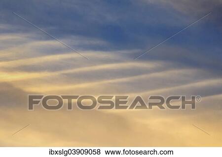 Altostratus clouds with a ribbed pattern in the evening sky View Large Photo Image Stock Photo - Altostratus clouds with a ribbed pattern in the evening sky. Fotosearch