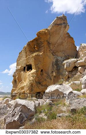 Stock Image - "Ancient cave houses in volcanic tuft rock formations, Love Valley, Goreme National Park, Cappadocia, Nevsehir Province, Central Anatolia Region, Turkey, Asia". Fotosearch