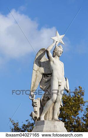 Stock Photography - "Angel statue, Passeig d'Isabel II, Pla del Palau, Barcelona,? Çï? ÇïSpain". Fotosearch
