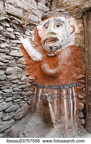 "Animistic figure as a guard at the entrance to a house, Kagbeni village, Lower Mustang, Nepal, Asia" View Large Photo Image Stock Photograph - "Animistic figure as a guard at the entrance to a house, Kagbeni village, Lower Mustang, Nepal, Asia". Fotosearch