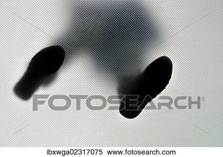 "Anonymous person standing with feet wide apart, from below" View Large Photo Image Stock Photography - "Anonymous person standing with feet wide apart, from below". Fotosearch