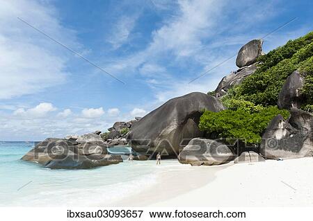 "Ao Kueak Beach, white sandy beach with rocks, Sail Rock at the rear, Nationalpark Mu Ko Similan, Ko Similan, Phang Nga Province, Thailand, Asia" View Large Photo Image Stock Photo - "Ao Kueak Beach, white sandy beach with rocks, Sail Rock at the rear, Nationalpark Mu Ko Similan, Ko Similan, Phang Nga Province, Thailand, Asia". Fotosearch