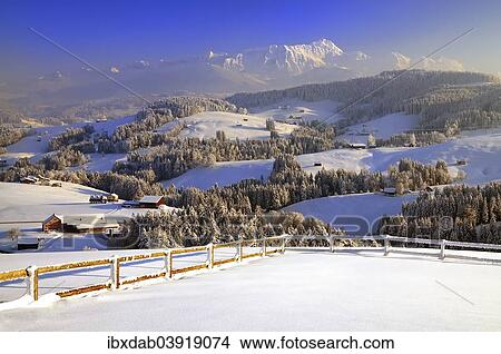 "Appenzeller winter landscape in evening light with view on the Santis, Appenzell, Switzerland, Europe" View Large Photo Image Picture - "Appenzeller winter landscape in evening light with view on the Santis, Appenzell, Switzerland, Europe". Fotosearch