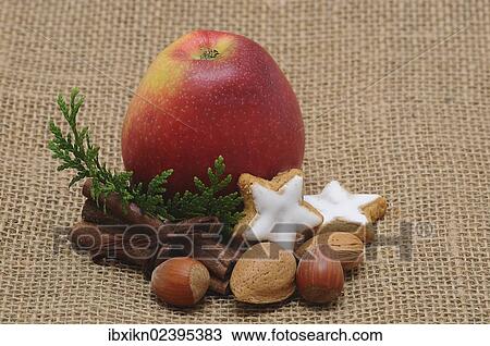 "Apple, cinnamon, nuts, Christmas motif" View Large Photo Image Stock Image - "Apple, cinnamon, nuts, Christmas motif". Fotosearch