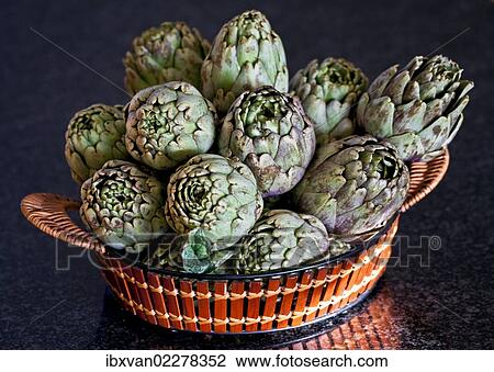Artichokes in a basket View Large Photo Image Stock Image - Artichokes in a basket. Fotosearch