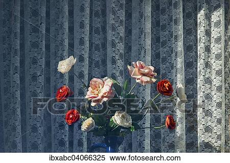 Stock Photography - "Artificial roses in front of a curtain, Bavaria, Germany, Europe". Fotosearch