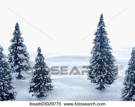 Artificial winter landscape with fir trees View Large Photo Image Stock Photography - Artificial winter landscape with fir trees. Fotosearch