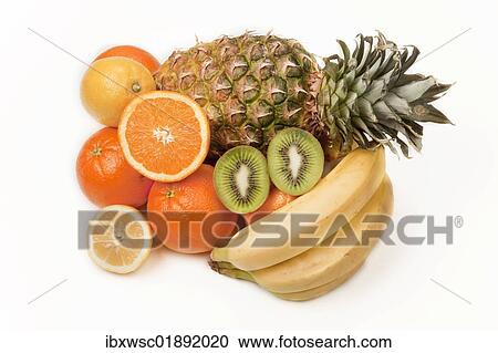 Stock Image - "Assorted fruit, pineapple, kiwi fruit, oranges, lemon". Fotosearch