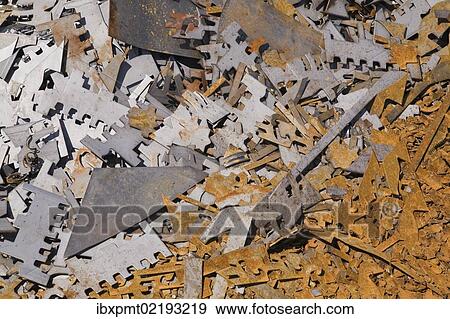 Stock Photo - "Assorted white and rusted metal brackets at a scrap metal recycling junkyard, Quebec, Canada, North America". Fotosearch