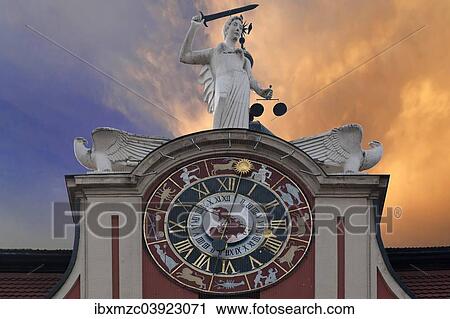 Stock Image - "Astronomical clock with a statue of Justice on the Baroque town hall of Bad Windsheim, rebuilt after a fire in 1732, Bad Windsheim, Middle Franconia, Franconia, Bavaria, Germany, Europe". Fotosearch