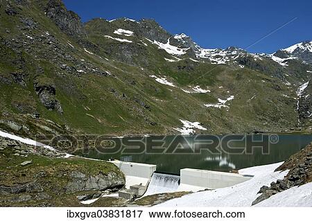 "At Lac de Louvie mountain lake, Val de Bagnes valley, Canton of Valais, Switzerland, Europe" View Large Photo Image Stock Photo - "At Lac de Louvie mountain lake, Val de Bagnes valley, Canton of Valais, Switzerland, Europe". Fotosearch