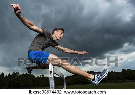 "Athlete, 19 years, jumping hurdles, Winterbach, Baden-Wurttemberg, Germany, Europe" View Large Photo Image Stock Image - "Athlete, 19 years, jumping hurdles, Winterbach, Baden-Wurttemberg, Germany, Europe". Fotosearch
