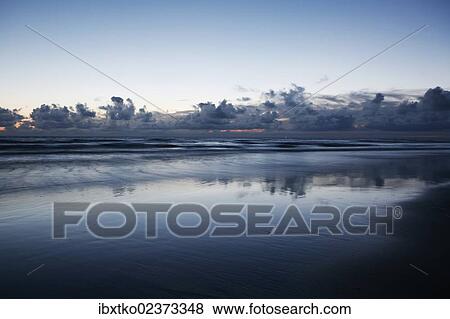 "Atlantic Ocean, Atlantic coast at low tide, beach, clouds, sunset near Naujac-sur-Mer, Aquitaine region, departement of Gironde, France, Europe" View Large Photo Image Stock Photo - "Atlantic Ocean, Atlantic coast at low tide, beach, clouds, sunset near Naujac-sur-Mer, Aquitaine region, departement of Gironde, France, Europe". Fotosearch