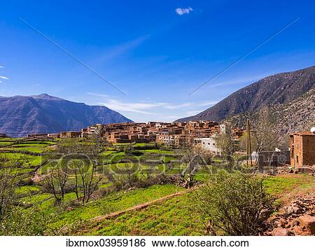 Stock Photograph - "Atlas Mountains, mud-brick village of Anammer at the back, Ourika Valley, Marrakech-Tensift-Al Haouz, Morocco, Africa". Fotosearch
