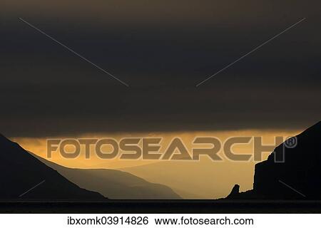 "Atmospheric clouds, ferry passage from Gamlaraett, Streymoy, to Skopun, Sandoy, Faroe Islands, Denmark, Europe" View Large Photo Image Stock Photograph - "Atmospheric clouds, ferry passage from Gamlaraett, Streymoy, to Skopun, Sandoy, Faroe Islands, Denmark, Europe". Fotosearch