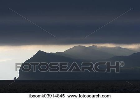 Stock Photography - "Atmospheric clouds, ferry passage from Gamlaraett, Streymoy, to Skopun, Sandoy, Faroe Islands, Denmark, Europe". Fotosearch