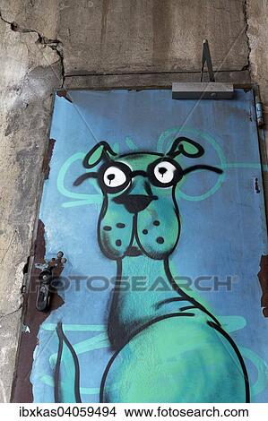Picture - "Attentive watchdog, sprayed picture on the door of an industrial ruin, street art, Dusseldorf, North Rhine-Westphalia, Germany, Europe". Fotosearch