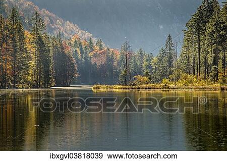 Stock Photo - "Autumn at Almsee lake, Grunau im Almtal, Upper Austria, Austria, Europe". Fotosearch