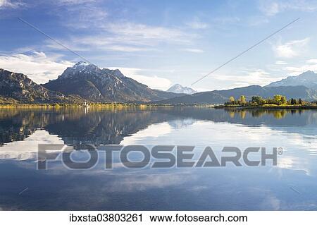 "Autumn mood with mountain views on Forggensee lake near Fussen, East Allgau, Bavaria, Germany, Europe" View Large Photo Image Stock Image - "Autumn mood with mountain views on Forggensee lake near Fussen, East Allgau, Bavaria, Germany, Europe". Fotosearch