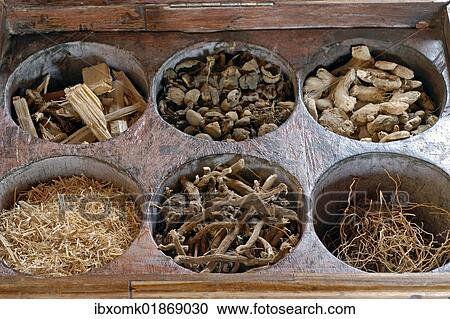 Stock Image - "Ayurvedic herbs and woods, Kollengode, Vengunad, Kerala, India, Asia". Fotosearch
