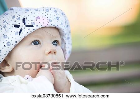 Stock Image - "Baby, 4-5 months old, Germany, Europe". Fotosearch