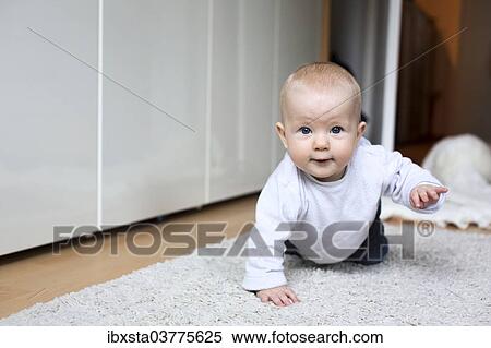"Baby, about seven months, crawling" View Large Photo Image Stock Photography - "Baby, about seven months, crawling". Fotosearch