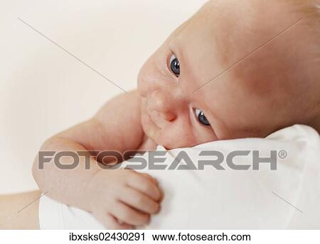 "Baby girl, 3 months, being held by her mother, portrait" View Large Photo Image Stock Image - "Baby girl, 3 months, being held by her mother, portrait". Fotosearch
